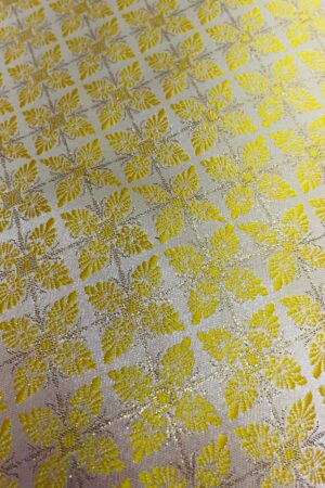 Beautiful banarasi fabric in golden floral weaving. Perfect for sarees, lehenga, blouse, kurta and ethnic wear. Gives a rich and traditional look (unstitched material).