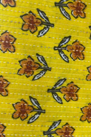Vibrant cotton fabric with orange floral print on yellow base, highlighted with kantha-style running stitches. Soft, breathable and traditional – perfect for kurtis, blouses, dresses and ethnic wear (unstitched material).